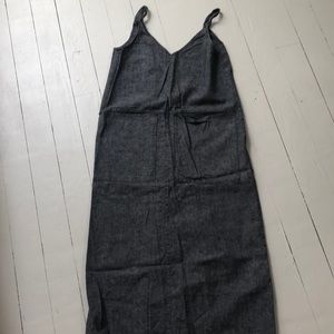 Gray v-neck dress with large front pockets